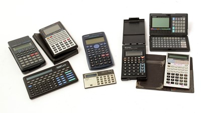 Lot 993 - Eight pocket calculator/computers, various.