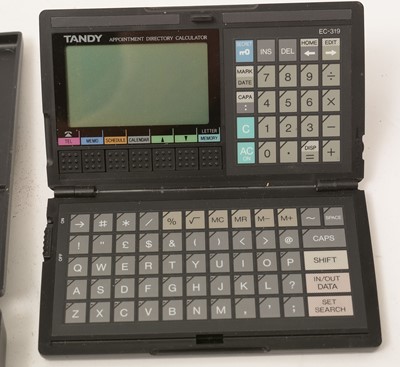 Lot 993 - Eight pocket calculator/computers, various.