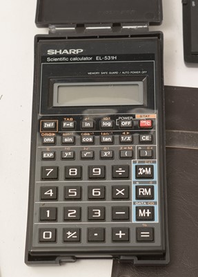 Lot 993 - Eight pocket calculator/computers, various.