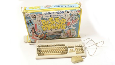Lot 958 - An Amiga 1200 by Commodore, with original accessories.