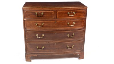 Lot 1169 - A George III mahogany and boxwood strung bowfront chest.