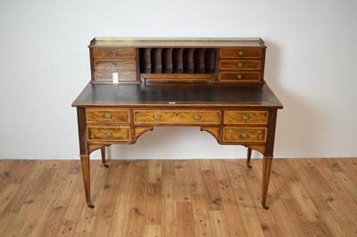Lot 5 - Heal & Son, London: a late Victorian inlaid writing desk.