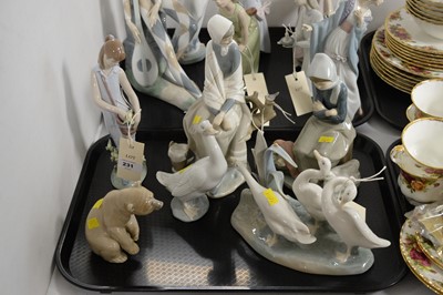 Lot 231 - A collection of Lladro figures - girls and animals; and three Nao figures, various.