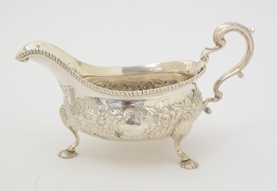 Lot 189 - A matched pair of silver sauceboats.