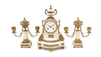 Lot 1043 - A late 19th Century French marble and ormolu three-piece clock garniture.