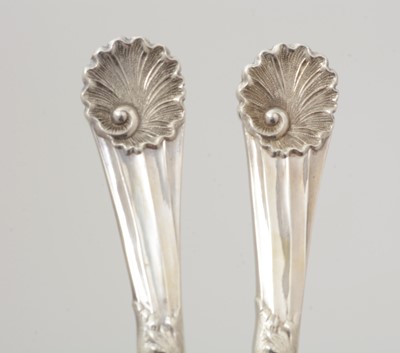 Lot 7 - A set of four late Victorian silver fruit serving spoons; and a pair of silver berry tablespoons.