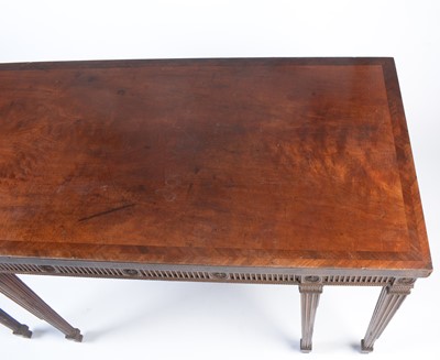 Lot 1112 - Manner of Mayhew & Ince: a George III mahogany and feather banded serving table.