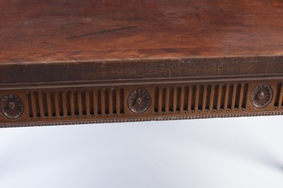 Lot 1112 - Manner of Mayhew & Ince: a George III mahogany and feather banded serving table.
