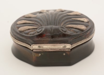 Lot 288 - An 18th Century silver-mounted tortoiseshell snuff box.