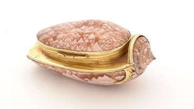 Lot 290 - A late 18th Century gold-mounted natural shell snuff box.