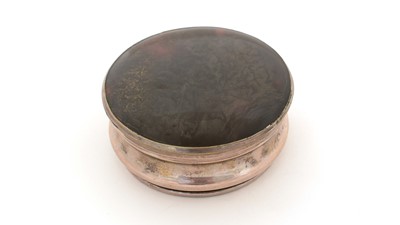 Lot 304 - An early period Old Sheffield plated circular snuff box.