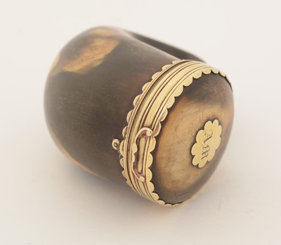 Lot 345 - An early 19th Century Scottish gold-mounted curly horn snuff mull.