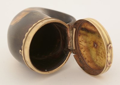 Lot 345 - An early 19th Century Scottish gold-mounted curly horn snuff mull.