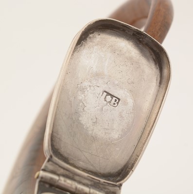 Lot 375 - An 18th Century Scottish silver-mounted curly horn snuff mull.