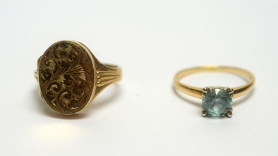 Lot 130 - A zircon ring and a locket ring