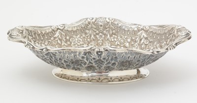 Lot 138 - A late Victorian embossed silver dish.
