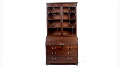Lot 1119 - A George III mahogany cylinder bureau bookcase.