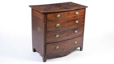 Lot 1128 - A George III mahogany bowfront chest.