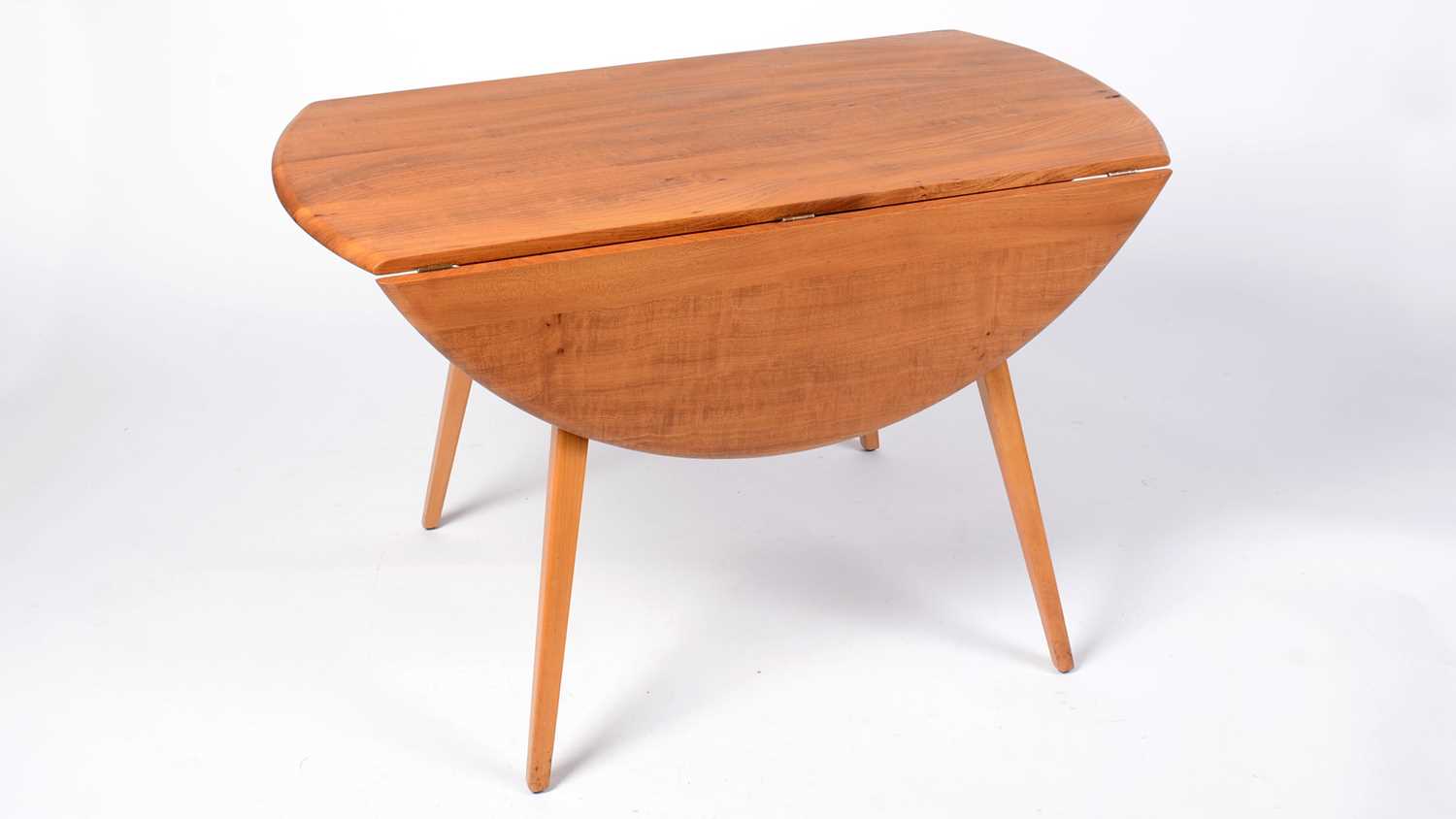 Lot 26 - Ercol - Lucian Ercolani - a retro vintage circa 1960's 20th Century elm dining table