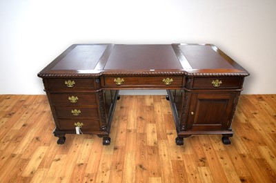 Lot 81 - A 20th Century mahogany partners desk