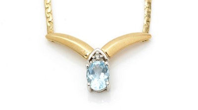 Lot 518 - A topaz and diamond necklace