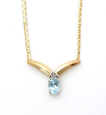 Lot 518 - A topaz and diamond necklace