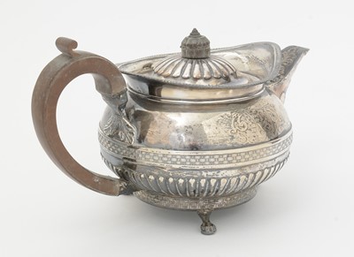 Lot 179 - A George III silver teapot.