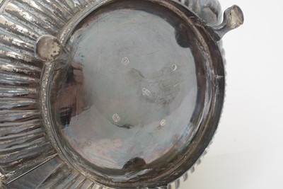 Lot 179 - A George III silver teapot.