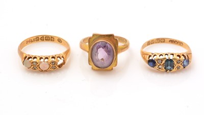 Lot 153 - Three gem set rings