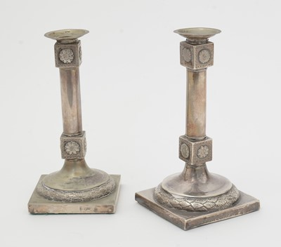 Lot 172 - Two very similar late 18th/early 19th Century candlesticks.