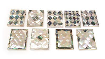 Lot 412 - Nine early Victorian mother-of-pearl and abalone shell card cases.