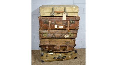 Lot 26 - A vintage leather trunk; and four vintage cases.