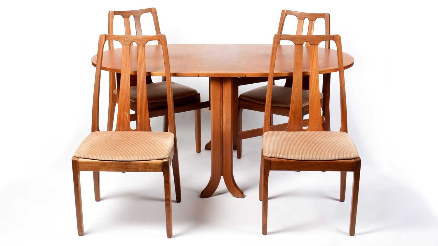 Lot 31 - Nathan - British modern design, a retro vintage teak wood extendable dining table and chairs.