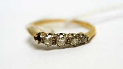 Lot 142 - A five stone diamond ring