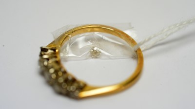 Lot 142 - A five stone diamond ring