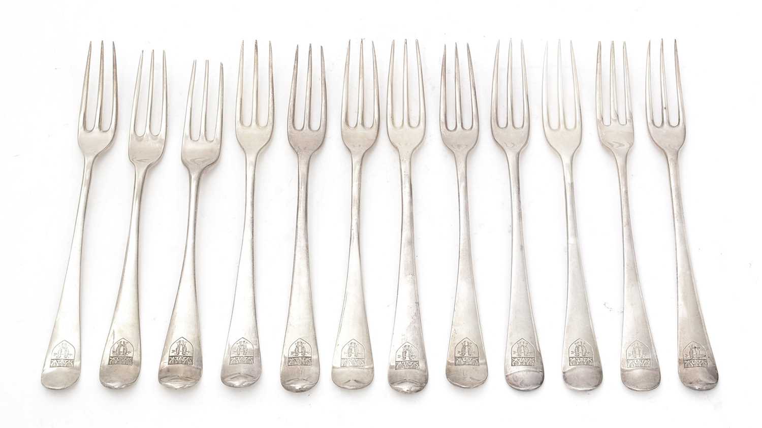 Lot 23 - A collected or Harlequin set of twelve George II/III table forks.