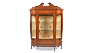 Lot 1144 - An Edwardian inlaid fiddle back mahogany breakfront china cabinet.