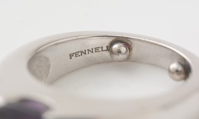 Lot 492 - Theo Fennell: an amethyst and 18ct white gold 'Arc' ring