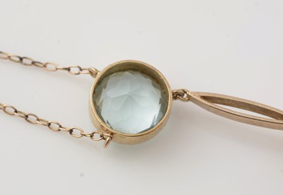 Lot 496 - An Edwardian aquamarine pendant