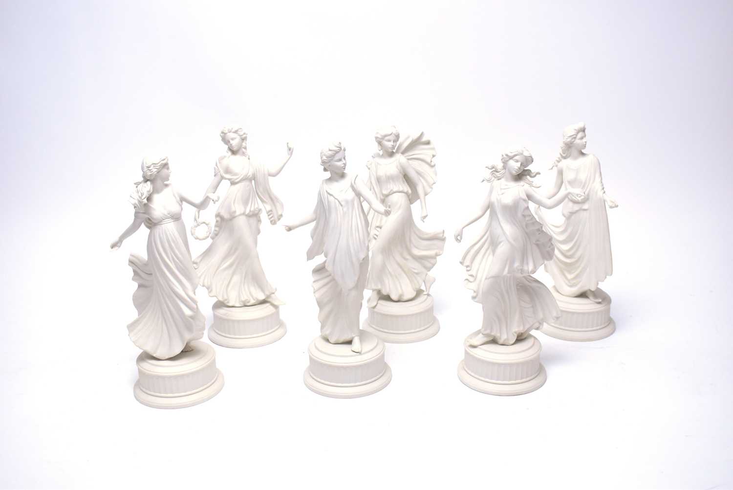 Lot 403 - A set of Wedgwood limited edition ‘The Dancing Hours’ Collection blanc de chine figures of ladies.
