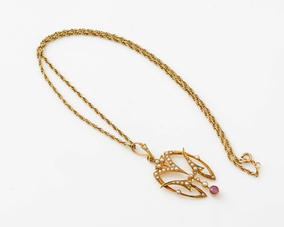 Lot 413 - An Edwardian seed pearl and pink sapphire pendant