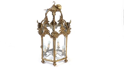 Lot 1066 - A heavy and ornate gilt bronze hexagonal ceiling lantern.