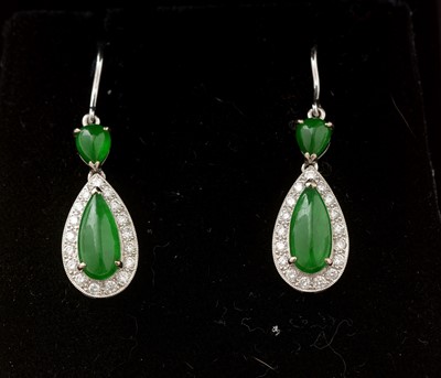 Lot 422 - A pair of jade and diamond cluster drop earrings