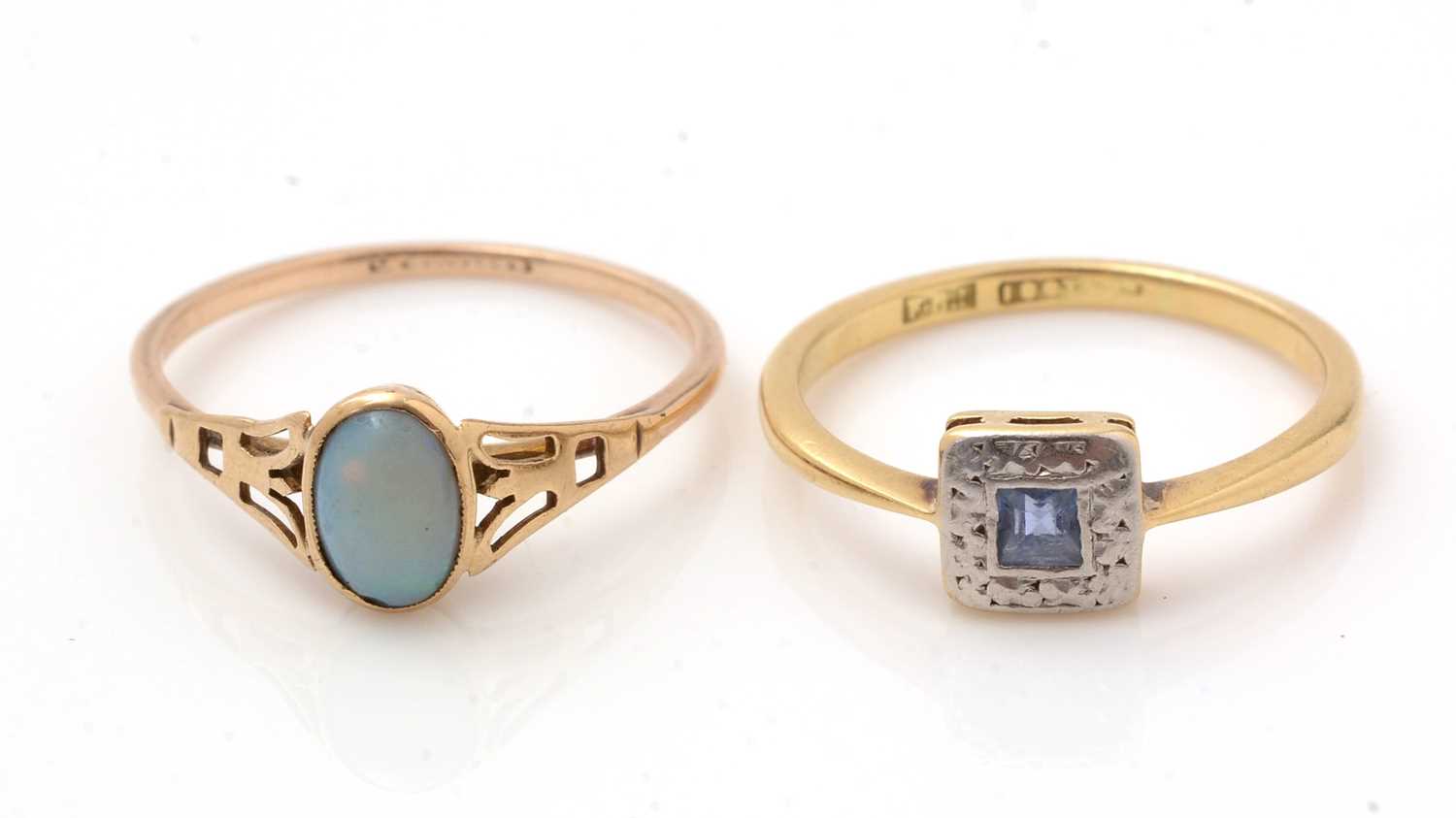 Lot 120 - A sapphire ring and an opal ring