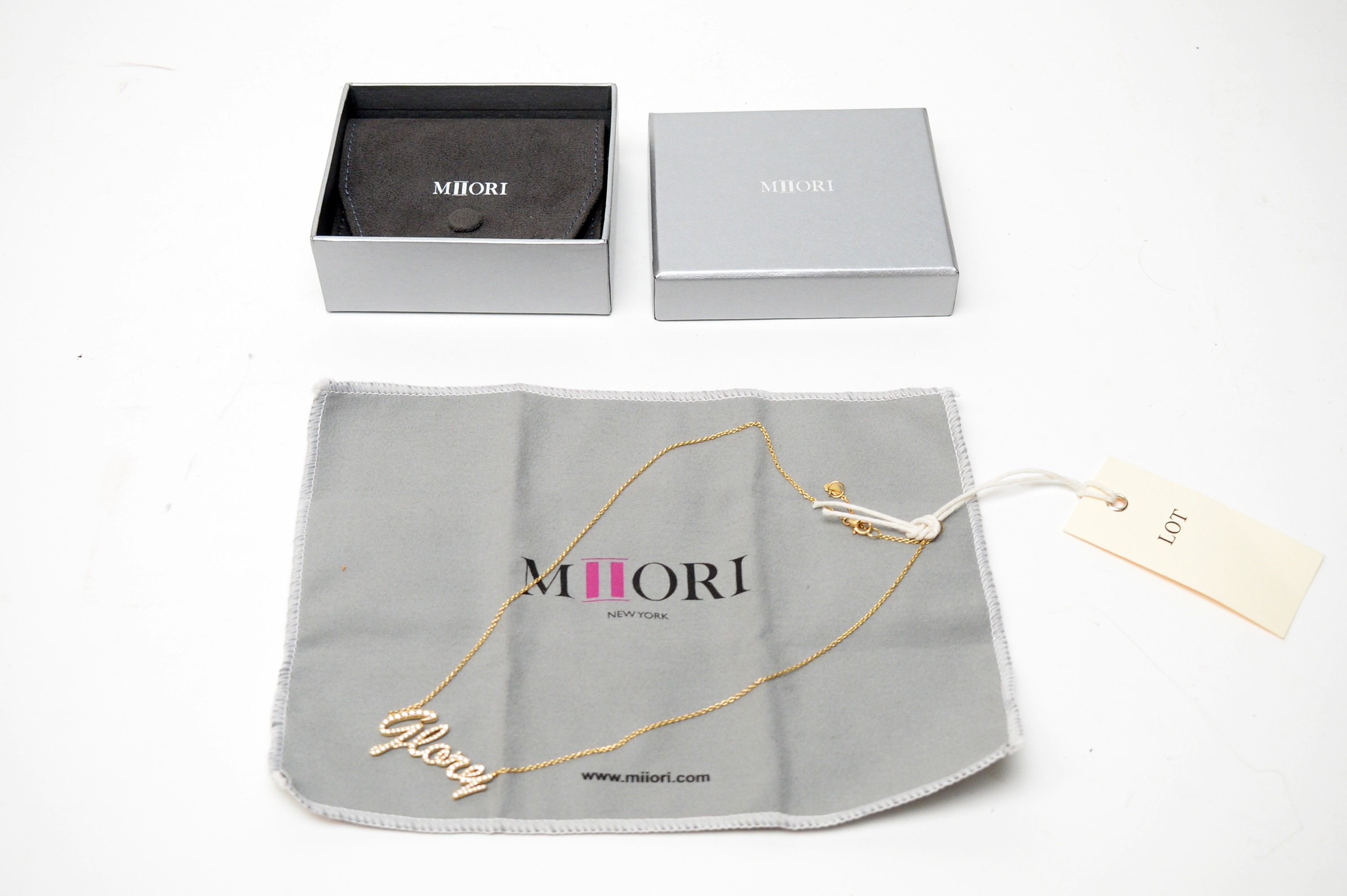 Lot 140 A diamond and 18ct yellow gold 'Glory'