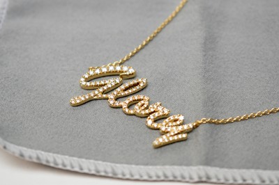 Lot 140 - A diamond and 18ct yellow gold 'Glory' necklace.