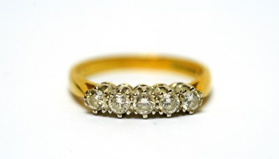 Lot 128 - A five-stone diamond ring