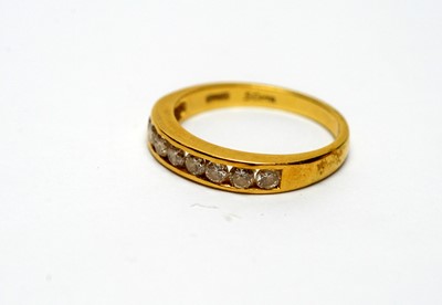 Lot 130 - An eight-stone diamond ring