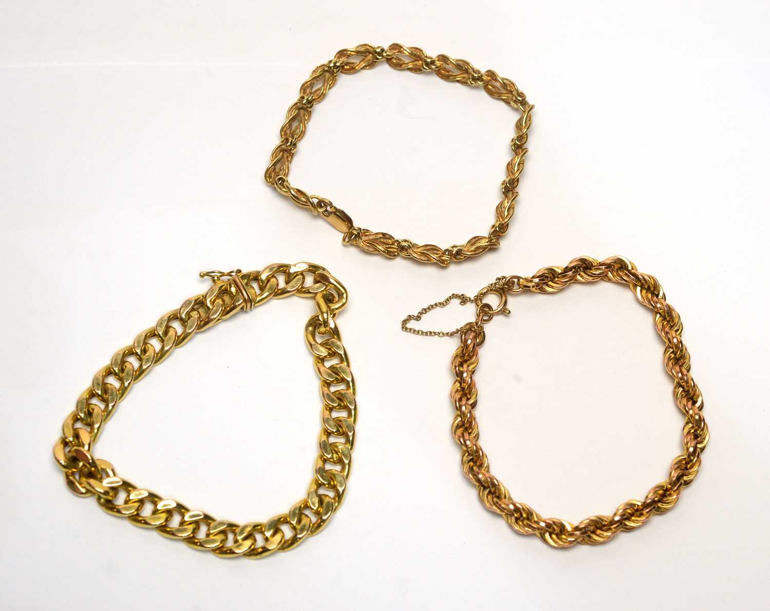 Lot 112 - Three 9ct yellow gold bracelets