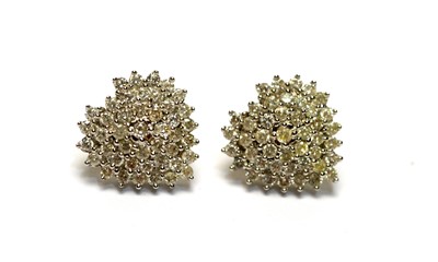 Lot 105 - A pair of diamond earrings